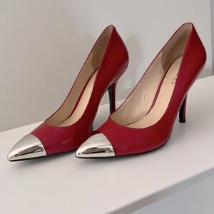 Red Guess heels with Chrome tip